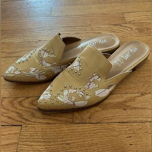 Pale yellow leather flats